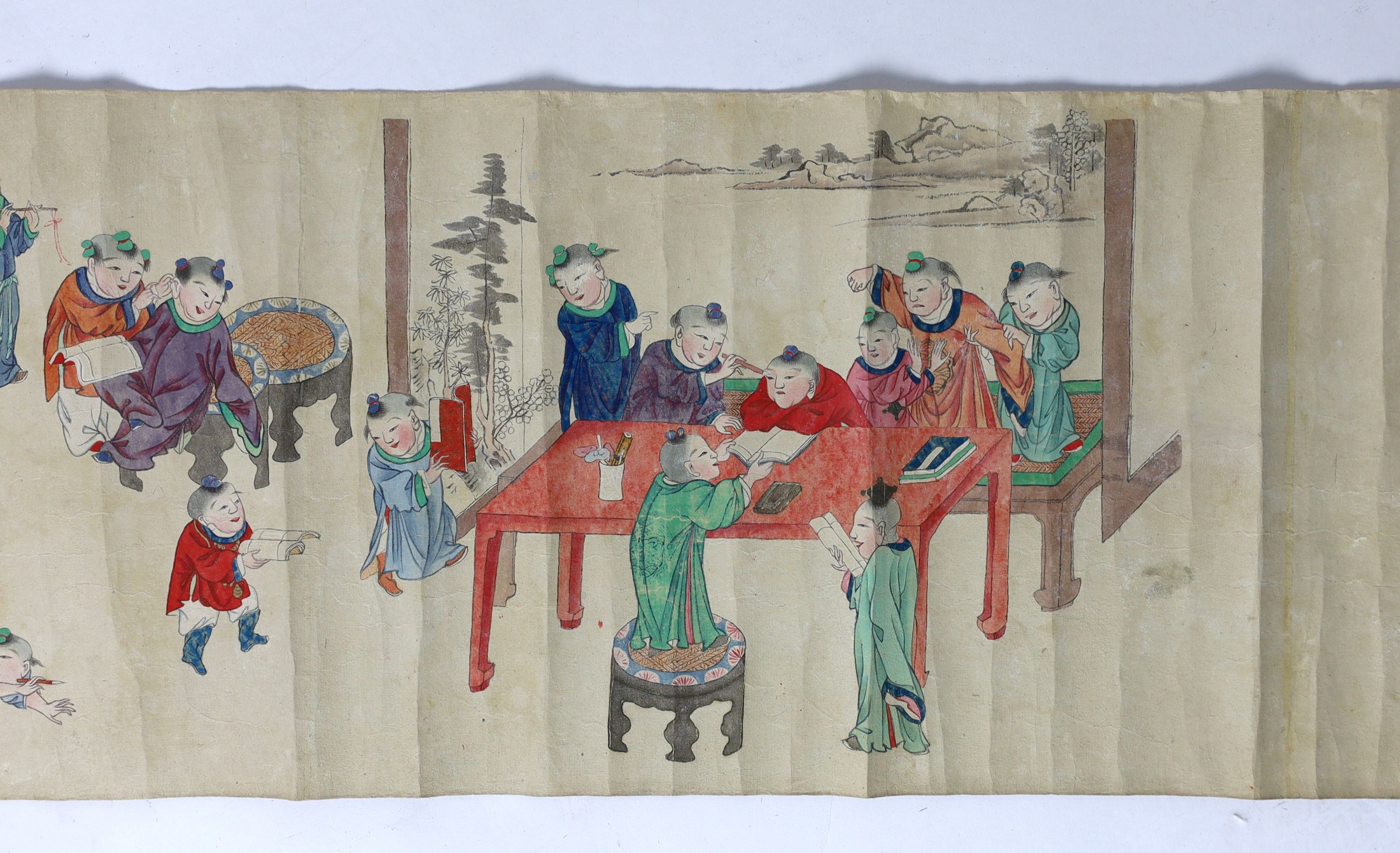 A Chinese handscroll painting on paper of ‘Hundred boys’ in a garden, late Qing dynasty, image 570cm x 26cm